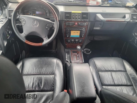 2002 Mercedes-Benz G-Class with VIN WDCYR49E72X133986, listed as a Copart auction lot 54624435 with 138,597 mi miles and Salvage Title. Bid and sale history available at carsss.com. Image 9.