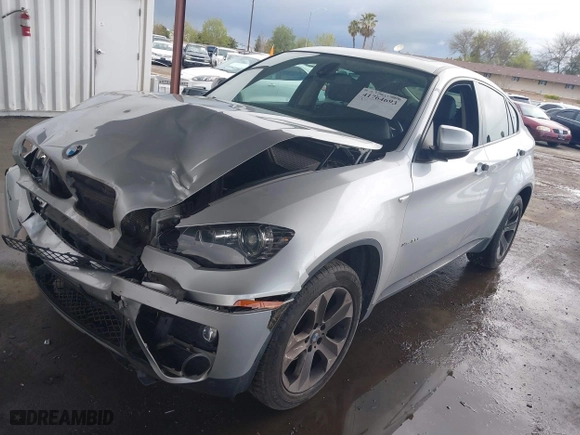 2014 BMW X6 xDrive35i with VIN 5UXFG2C56E0K41592, listed as a IAAI auction lot 41764693 with 67,234 mi miles. Bid and sale history available at carsss.com. Image 18.