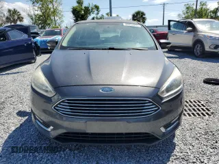 2015 Ford Focus Titanium with VIN 1FADP3N24FL260486, listed as a Copart auction lot 49856865 with Not provided miles and Clean title. Bid and sale history available at DreamBid. Image 5.
