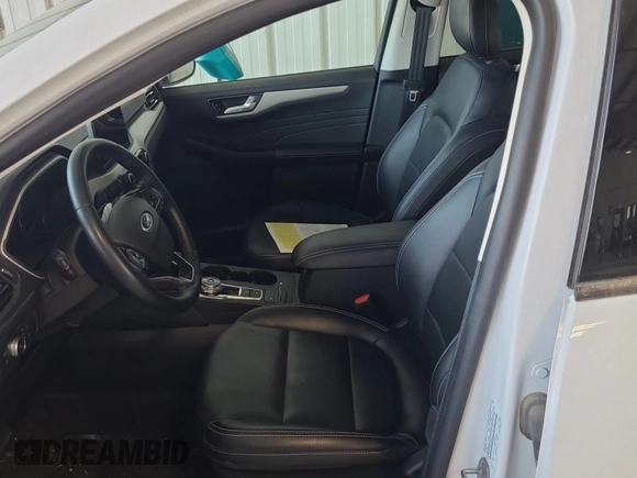2021 Ford Escape SEL Hybrid with VIN 1FMCU9CZ1MUB25597, listed as a IAAI auction lot 42663573 with 79,061 mi miles and . Bid and sale history available at DreamBid. Image 28.