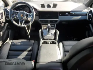 2021 Porsche Cayenne with VIN WP1AA2AY6MDA05024, listed as a Copart auction lot 52023595 with 24,455 mi miles and Salvage title. Bid and sale history available at DreamBid. Image 8.