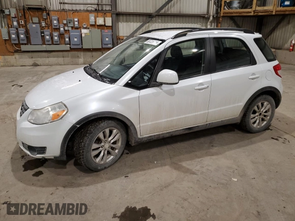 2013 Suzuki SX4 Crossover z VIN JS2YB5A30D6102684, wystawiony jako Copart lot #88725715 z przebiegiem 104 023 mil mil oraz Szkoda całkowita • Salvage title. Historia ofert i sprzedaży dostępna na DreamBid. Obrazek 1.