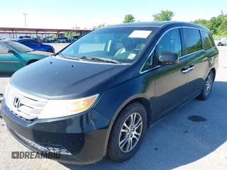 2011 Honda Odyssey EX-L with VIN 5FNRL5H66BB058333, listed as a IAAI auction lot 42172045 with 215,723 mi miles and . Bid and sale history available at carsss.com. Image 2.