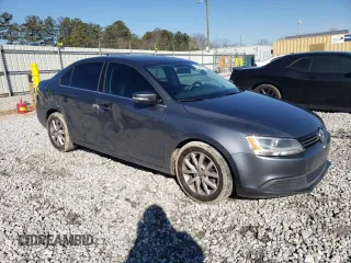 2014 Volkswagen Jetta Sedan SE w/Connectivity with VIN 3VWD07AJ7EM411432, listed as a Copart auction lot 43646655 with 138,430 mi miles and Salvage Title. Bid and sale history available at carsss.com. Image 4.
