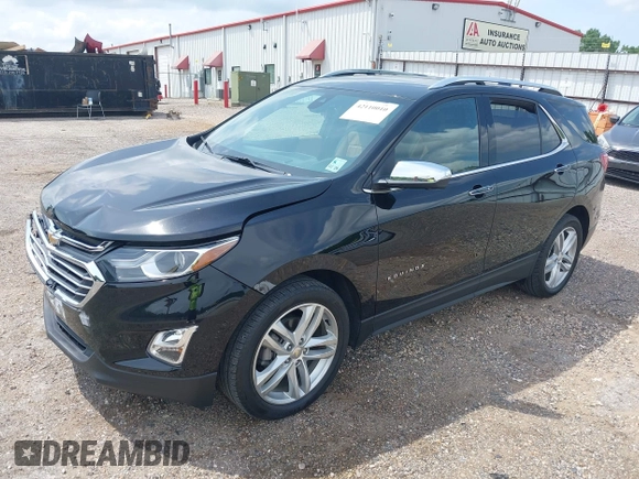 2021 Chevrolet Equinox Premier with VIN 2GNAXNEV5M6151910, listed as a IAAI auction lot 42110010 with 45,911 mi miles and . Bid and sale history available at DreamBid. Image 2.