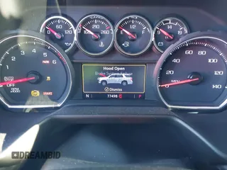 2021 Chevrolet Suburban RST z VIN 1GNSCEKD2MR340613, wystawiony jako IAAI lot #41853016 z przebiegiem 77 498 mil mil oraz . Historia ofert i sprzedaży dostępna na DreamBid. Obrazek 7.