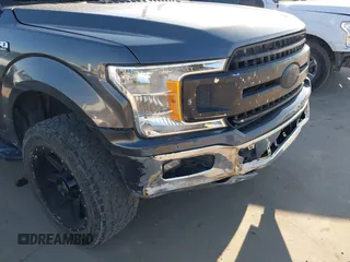 2019 Ford F-150 XL with VIN 1FTEW1CB3KKC43753, listed as a IAAI auction lot 41036512 with 108,257 mi miles and . Bid and sale history available at carsss.com. Image 6.