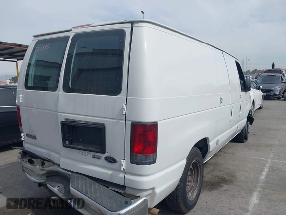 2009 Ford Econoline Cargo Commercial with VIN 1FTNE14W09DA38068, listed as a IAAI auction lot 41690071 with 182,337 mi miles and . Bid and sale history available at DreamBid. Image 4.