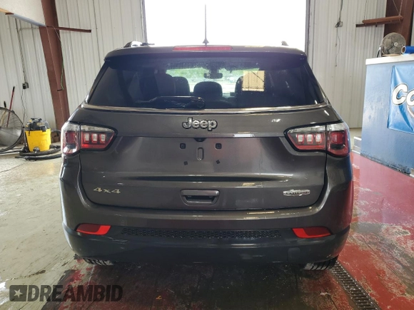 2018 Jeep Compass Altitude with VIN 3C4NJDBB9JT457242, listed as a Copart auction lot 60886385 with 143,467 mi miles and Salvage title. Bid and sale history available at DreamBid. Image 6.