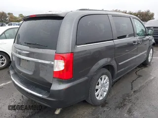 2015 Chrysler Town & Country Touring with VIN 2C4RC1BG9FR720782, listed as a IAAI auction lot 41765488 with 129,889 mi miles and . Bid and sale history available at DreamBid. Image 4.