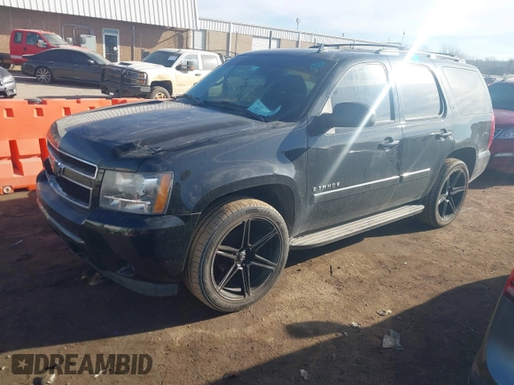 2008 Chevrolet Tahoe 3LT with VIN 1GNFC13J68R156148, listed as a IAAI auction lot 41607340 with 154,533 mi miles and . Bid and sale history available at DreamBid. Image 2.
