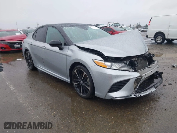 2020 Toyota Camry XSE with VIN 4T1K61AK1LU318098, listed as a IAAI auction lot 41097712 with 64,118 mi miles and . Bid and sale history available at DreamBid. Image 1.