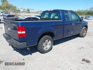2007 Ford F-150 STX with VIN 1FTRX12W27NA23724, listed as a IAAI auction lot 41789668 with 255,067 mi miles and . Bid and sale history available at DreamBid. Image 4.