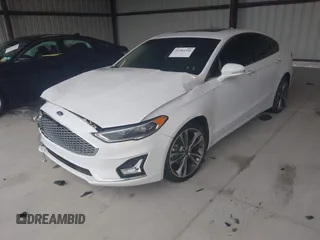 2019 Ford Fusion Titanium with VIN 3FA6P0K95KR271291, listed as a IAAI auction lot 41983320 with 71,962 mi miles and . Bid and sale history available at DreamBid. Image 22.