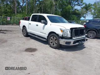 2019 Nissan Titan SV with VIN 1N6AA1E64KN516174, listed as a IAAI auction lot 42365095 with 59,400 mi miles and . Bid and sale history available at DreamBid. Image 1.