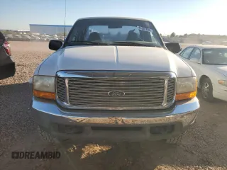 1999 Ford F-250 XL with VIN 1FTNX21L5XEE86694, listed as a Copart auction lot 41697885 with 153,948 mi miles and Salvage title. Bid and sale history available at DreamBid. Image 5.