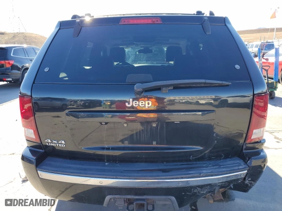2009 Jeep Grand Cherokee Limited with VIN 1J8HR58T49C544722, listed as a Copart auction lot 86772094 with 100,010 mi miles and Salvage Title. Bid and sale history available at carsss.com. Image 6.