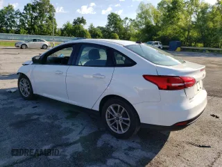 2017 Ford Focus SE with VIN 1FADP3F28HL309268, listed as a Copart auction lot 57995985 with 99,277 mi miles and Salvage title. Bid and sale history available at DreamBid. Image 2.