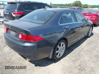 2005 Acura TSX with VIN JH4CL96935C016390, listed as a IAAI auction lot 42296236 with 125,033 mi miles and . Bid and sale history available at DreamBid. Image 4.