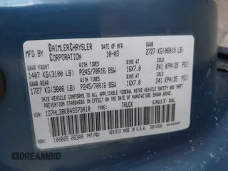 2004 Dodge Dakota Sport with VIN 1D7HL38K84S573410, listed as a IAAI auction lot 41495481 with 218,866 mi miles. Bid and sale history available at carsss.com. Image 9.