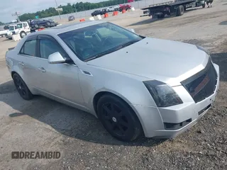 2009 Cadillac CTS RWD with VIN 1G6DF577690161579, listed as a IAAI auction lot 42651953 with 103,168 mi miles and . Bid and sale history available at DreamBid. Image 1.