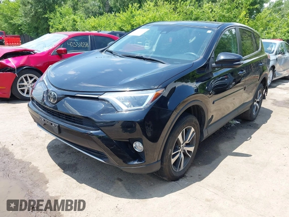 2018 Toyota RAV4 XLE with VIN 2T3WFREV3JW468450, listed as a IAAI auction lot 42528560 with 77,513 mi miles and . Bid and sale history available at DreamBid. Image 2.