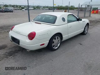 2003 Ford Thunderbird Deluxe with VIN 1FAHP60A03Y113355, listed as a IAAI auction lot 41890414 with 147,620 mi miles. Bid and sale history available at carsss.com. Image 4.