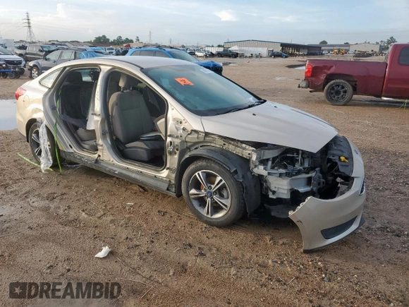 2017 Ford Focus SE with VIN 1FADP3F22HL274842, listed as a Copart auction lot 60970745 with 154,210 mi miles and Salvage title. Bid and sale history available at DreamBid. Image 4.