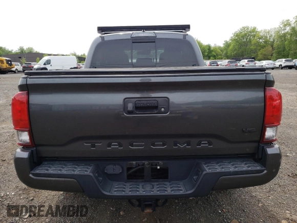 2019 Toyota Tacoma SR z VIN 3TMCZ5AN6KM283109, wystawiony jako Copart lot #58668905 z przebiegiem 44 923 mil mil oraz Szkoda całkowita • Salvage title. Historia ofert i sprzedaży dostępna na DreamBid. Obrazek 6.