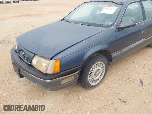 1987 Ford Taurus z VIN 1FABP53U0HA101874, wystawiony jako IAAI lot #42619153 z przebiegiem Nie podano mil oraz . Historia ofert i sprzedaży dostępna na DreamBid. Obrazek 6.