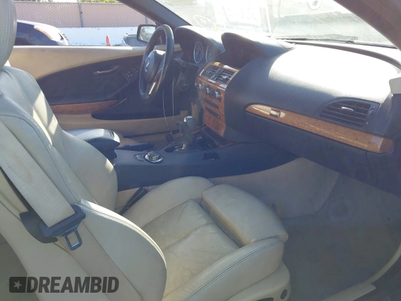2006 BMW 6 Series 650Ci z VIN WBAEK13436CN76285, wystawiony jako IAAI lot #42283475 z przebiegiem Nie podano mil oraz . Historia ofert i sprzedaży dostępna na DreamBid. Obrazek 5.