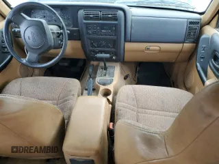 1998 Jeep Cherokee Sport with VIN 1J4FJ68S6WL188802, listed as a Copart auction lot 52094005 with 199,586 mi miles and Salvage Title. Bid and sale history available at carsss.com. Image 8.