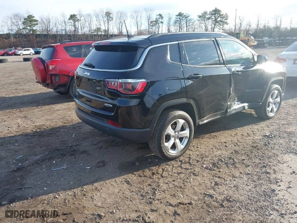 2019 Jeep Compass Latitude with VIN 3C4NJDBB9KT828935, listed as a IAAI auction lot 41865492 with 102,744 mi miles. Bid and sale history available at carsss.com. Image 4.