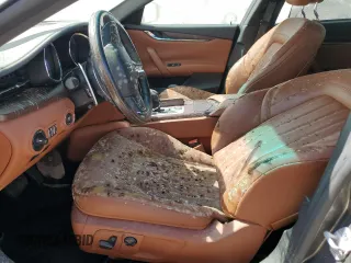 2016 Maserati Quattroporte S Q4 z VIN ZAM56RRA2G1188539, wystawiony jako Copart lot #74623484 z przebiegiem Nie podano mil oraz Szkoda całkowita • Salvage title. Historia ofert i sprzedaży dostępna na DreamBid. Obrazek 7.
