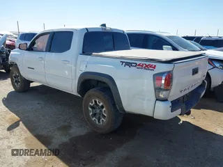2023 Toyota Tacoma 4WD SR with VIN 3TMCZ5AN7PM653250, listed as a IAAI auction lot 41673534 with 19,496 mi miles. Bid and sale history available at carsss.com. Image 3.