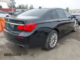 2015 BMW 7 Series 740i with VIN WBAYA6C54FG273188, listed as a IAAI auction lot 42563572 with 70,675 mi miles and . Bid and sale history available at DreamBid. Image 4.