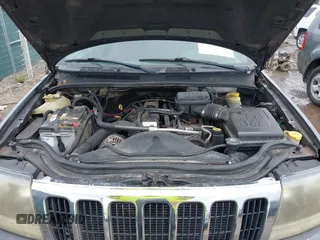 2003 Jeep Grand Cherokee Laredo z VIN 1J4GW48S73C545863, wystawiony jako IAAI lot #42222247 z przebiegiem 128 529 mil mil oraz . Historia ofert i sprzedaży dostępna na DreamBid. Obrazek 10.
