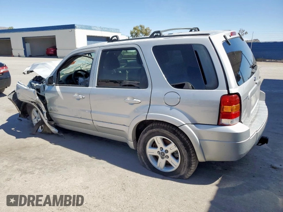 2005 Ford Escape Hybrid z VIN 1FMCU96H75KB95718, wystawiony jako Copart lot #60000825 z przebiegiem Nie podano mil oraz Czysty tytuł • Clean title. Historia ofert i sprzedaży dostępna na DreamBid. Obrazek 2.