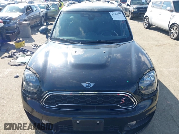 2019 MINI Countryman Cooper S z VIN WMZYT3C53K3J32447, wystawiony jako IAAI lot #41480577 z przebiegiem 43 948 mil mil oraz . Historia ofert i sprzedaży dostępna na DreamBid. Obrazek 13.