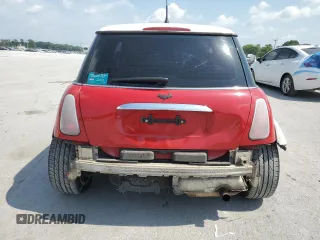 2004 MINI Hardtop with VIN WMWRC33444TC50103, listed as a Copart auction lot 63449615 with 144,467 mi miles and Salvage title. Bid and sale history available at DreamBid. Image 6.
