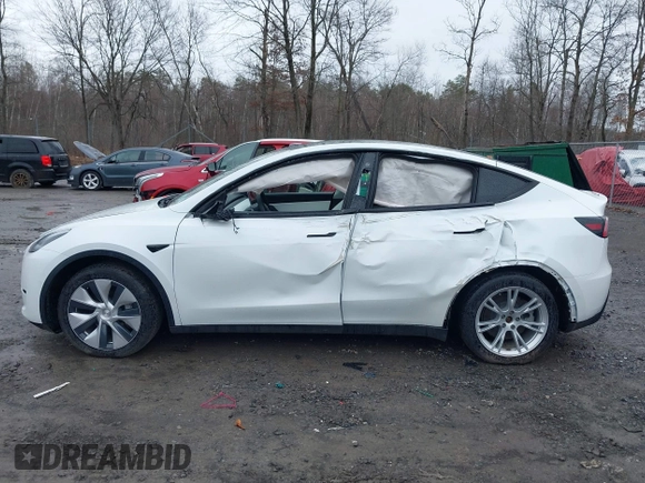 2020 Tesla Model Y Long Range with VIN 5YJYGDEE4LF044843, listed as a IAAI auction lot 41799504 with 40,770 mi miles and . Bid and sale history available at DreamBid. Image 14.