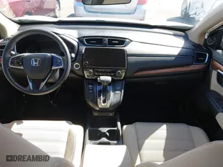 2020 Honda CR-V EX with VIN 5J6RW1H51LA013490, listed as a IAAI auction lot 41703228 with 62,896 mi miles. Bid and sale history available at carsss.com. Image 5.