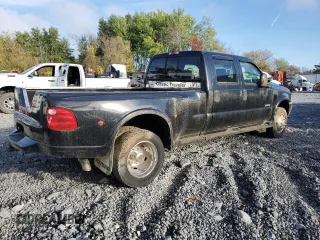 2003 Ford F-450 XL with VIN 1FDXW46P13EC18704, listed as a Copart auction lot 73657814 with 153,552 mi miles and Salvage Title. Bid and sale history available at carsss.com. Image 3.