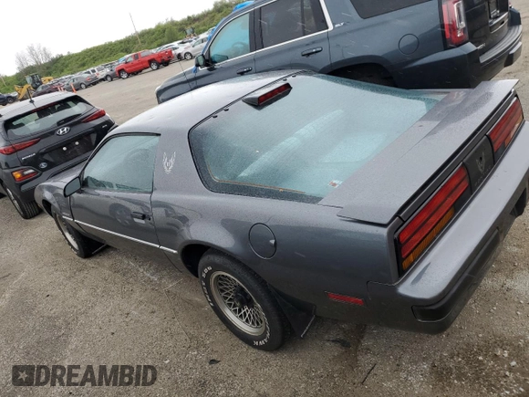1986 Pontiac Firebird with VIN 1G2FS87S2GL247754, listed as a Copart auction lot 49340634 with 52,081 mi miles and Salvage Title. Bid and sale history available at carsss.com. Image 2.
