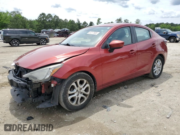2016 Scion iA z VIN 3MYDLBZV6GY129364, wystawiony jako Copart lot #57217905 z przebiegiem 139 110 mil mil oraz Tytuł czysty. Historia ofert i sprzedaży dostępna na DreamBid. Obrazek 1.