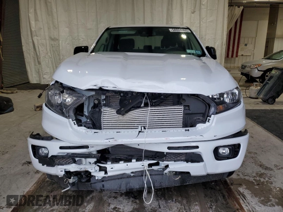 2023 Ford Ranger XL with VIN 1FTER4FHXPLE05663, listed as a Copart auction lot 60577925 with 29,218 mi miles and Salvage title. Bid and sale history available at DreamBid. Image 5.