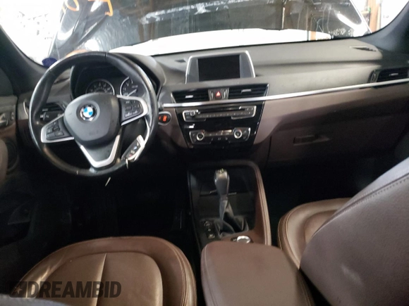 2017 BMW X1 xDrive28i with VIN WBXHT3C34H5F87048, listed as a Copart auction lot 67545012 with 76,666 mi miles. Bid and sale history available at carsss.com. Image 8.