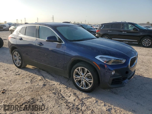 2018 BMW X2 sDrive28i with VIN WBXYJ3C35JEJ89968, listed as a Copart auction lot 52626525 with 68,945 mi miles and Salvage title. Bid and sale history available at DreamBid. Image 4.