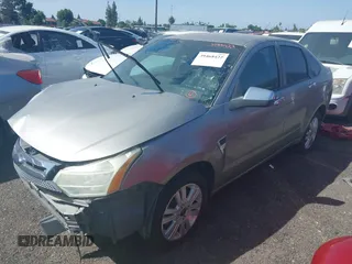 2008 Ford Focus SE with VIN 1FAHP35N88W242103, listed as a IAAI auction lot 39468422 with 169,911 mi miles. Bid and sale history available at carsss.com. Image 2.