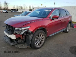 2021 Mazda CX-9 Carbon Edition with VIN JM3TCBDY8M0521688, listed as a Copart auction lot 84117884 with 21,802 mi miles and Salvage title. Bid and sale history available at DreamBid. Image 1.